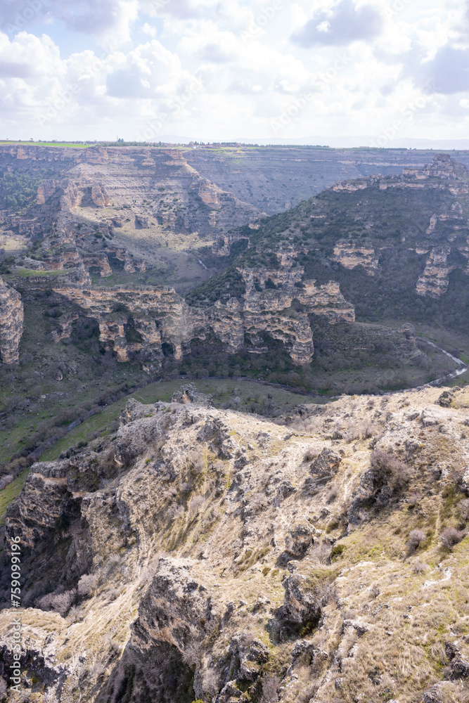 Ulubey Canyon is a nature park in the Ulubey and Karahallı of Usak, Turkey. The park provides suitable habitat for many species of animals and plants and is being developed as a centre for ecotourism. Ulubey Canyon is a nature park in the Ulubey and Karahallı of Usak, Turkey. The park provides suitable habitat for many species of animals and plants and is being developed as a centre for ecotourism.
