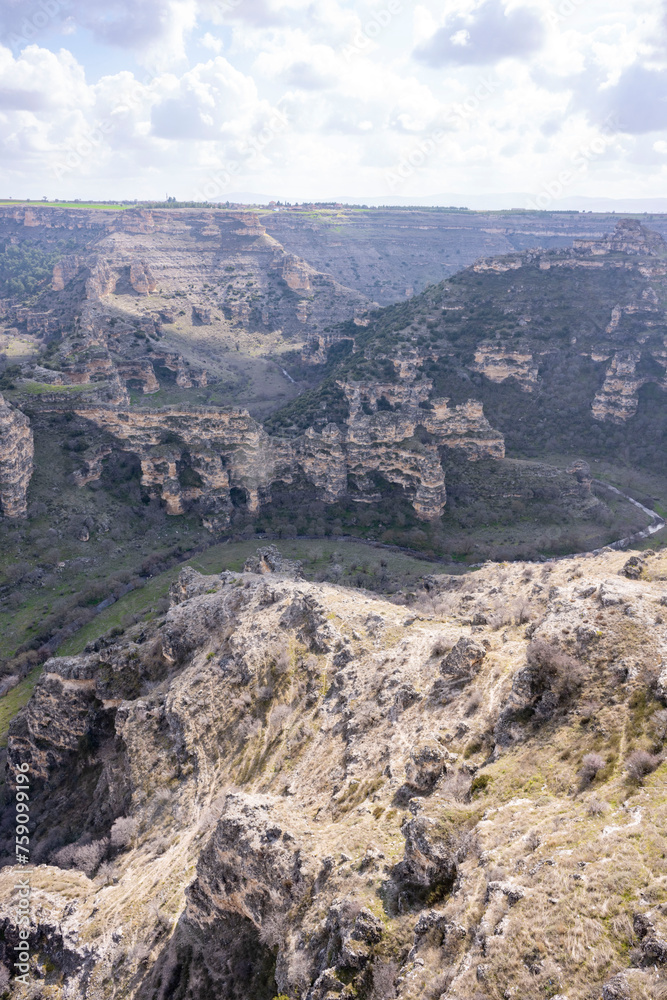 Ulubey Canyon is a nature park in the Ulubey and Karahallı of Usak, Turkey. The park provides suitable habitat for many species of animals and plants and is being developed as a centre for ecotourism.