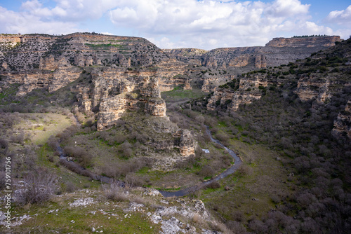 Ulubey Canyon is a nature park in the Ulubey and Karahallı of Usak, Turkey. The park provides suitable habitat for many species of animals and plants and is being developed as a centre for ecotourism.