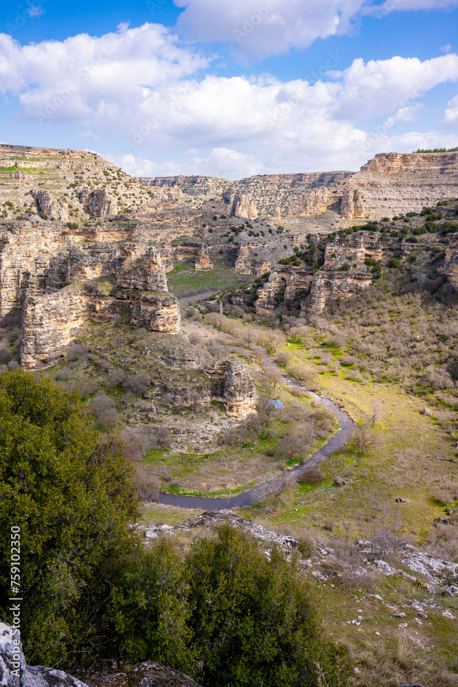 Ulubey Canyon is a nature park in the Ulubey and Karahallı of Usak, Turkey. The park provides suitable habitat for many species of animals and plants and is being developed as a centre for ecotourism.