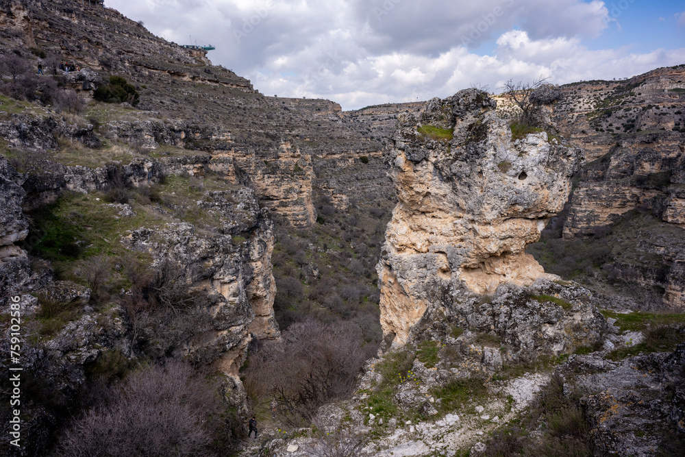 Ulubey Canyon is a nature park in the Ulubey and Karahallı of Usak, Turkey. The park provides suitable habitat for many species of animals and plants and is being developed as a centre for ecotourism.