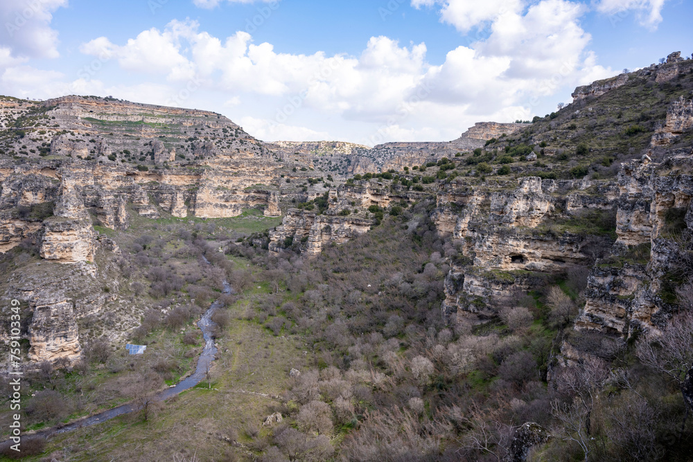 Ulubey Canyon is a nature park in the Ulubey and Karahallı of Usak, Turkey. The park provides suitable habitat for many species of animals and plants and is being developed as a centre for ecotourism.