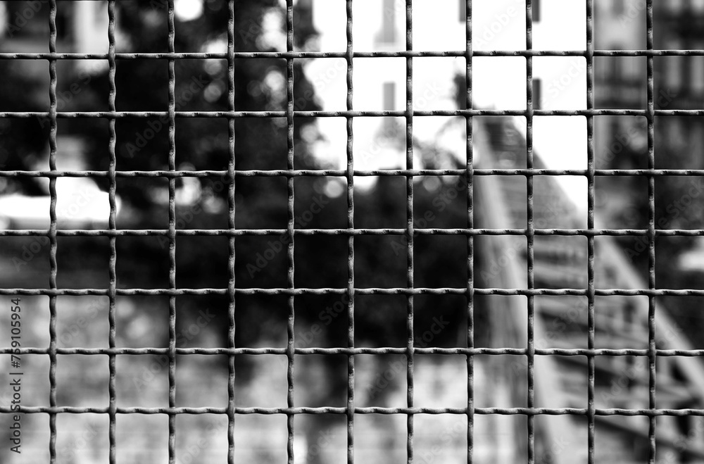 Ταπετσαρία protective metal grille with dark tones and a dramatic black and white effect