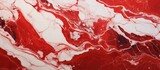 Marble with abstract red design.