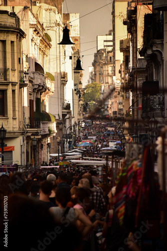 Street with a lot of people in the traditional San Telmo´s fair and typical Buenos Aire´s historical constructions. Argentina at the afternoon