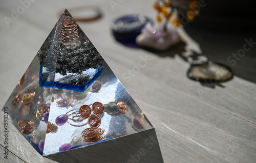 Isolated close up of a beautiful blue orgone generator pyramid- Israel