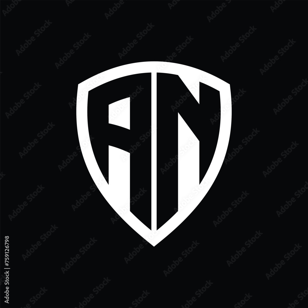 AN monogram logo with bold letters shield shape with black and white color design AN monogram logo with bold letters shield shape with black and white color design