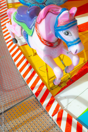 Top view of a colorful Carrousel Horse, vertical image.