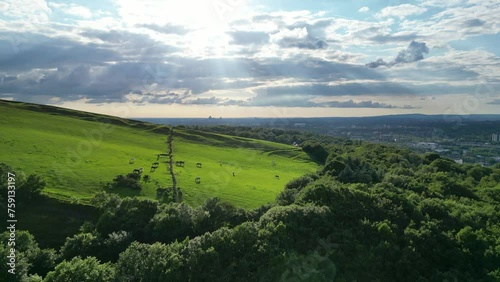 Stalybridge, Tameside, England. Manchester skyline in in the background, on a dramatic cloudy day. photo