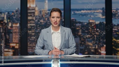 Cheerful lady announcer talking news at studio closeup. Woman ending broadcast