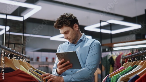 Canvas Print Shop worker checking tablet doing inventory mall closeup