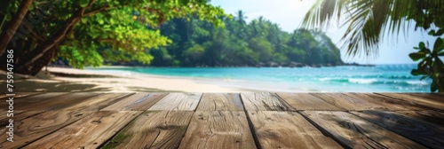 Empty wooden planks table against a blurred background with a sea coast with palm trees during the day, banner © serz72