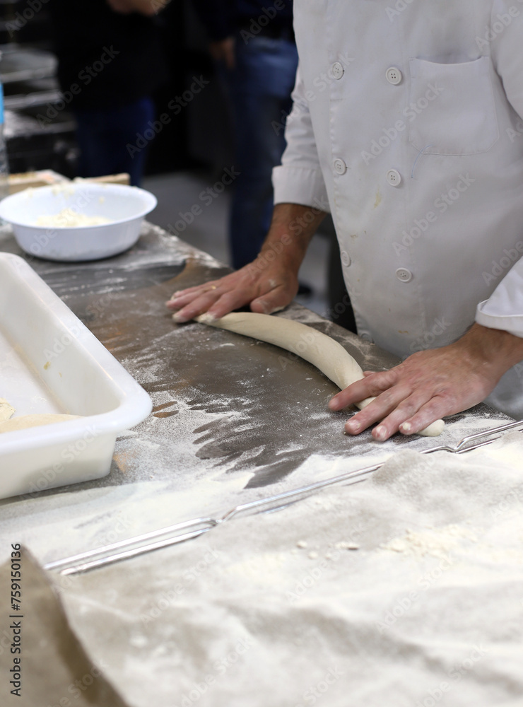 Fototapeta premium professional baker making sourdough bread
