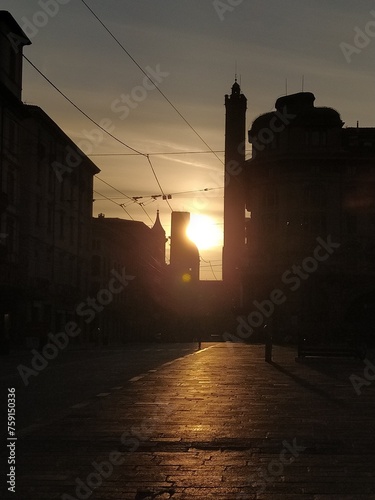 Sunset between the Garisenda tower and the Asinelli tower in Bologna photo