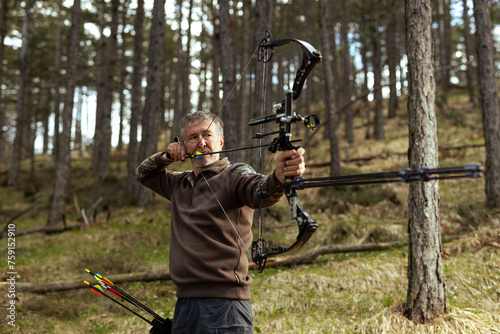 Portrait of an archer drawing a bow