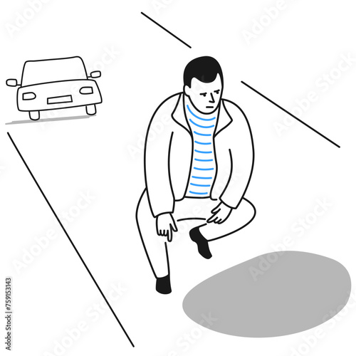 Male driver looking at pothole in road