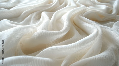 a close up view of a white fabric with a wavy design on the bottom of the fabric and bottom of the fabric.