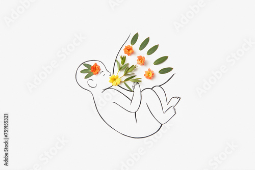 Line drawing of newborn baby sucking mother's breast with flowers photo
