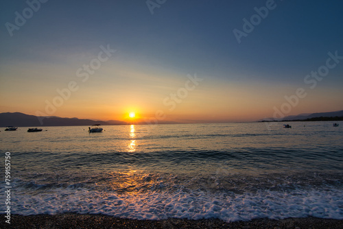 selianitika bay sun rise peloponnese photo