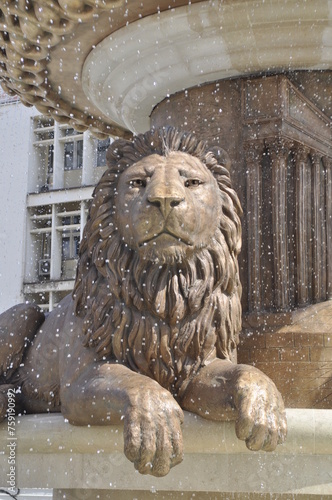 Lion statue and fountain in the centre of Macedonia Square in Skopje city photo