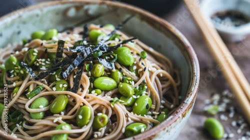 refreshing noodle salad, with cold soba noodles, edamame, and shredded seaweed, all tossed in a zesty miso dressing