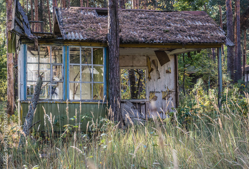 Ruined holiday cottage in Izumrudnoe summer camp in Chernobyl Exclusion Zone, Ukraine