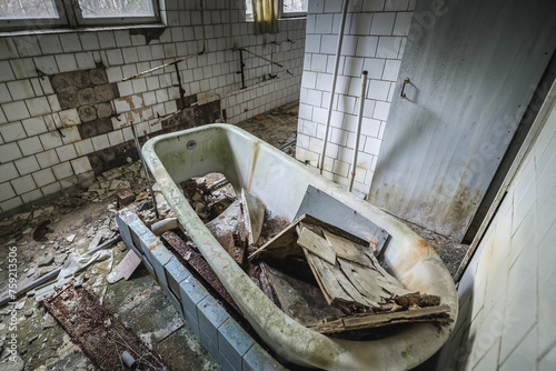Bath tube in sanatorium called Solnechny - Sunny in Pripyat ghost city in Chernobyl Exclusion Zone, Ukraine photo