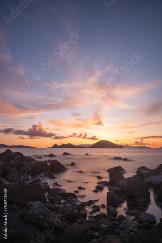 Fototapeta Naklejka Na Ścianę i Meble -  sunset on the beach. Seaside town of Turgutreis and spectacular sunsets. Selective Focus. Long Exposure shoot. tranquility scene.