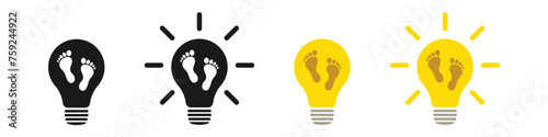 Set of light bulbs with human footprints, illustration