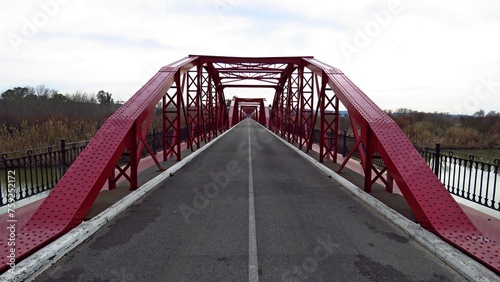 metal bridge over the tajo river Talavera de la Reina red engineering steel rivets