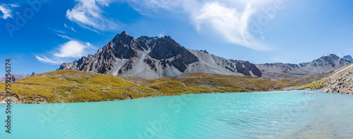 Beautiful scenery of snow-capped mountains and lakes along the Duku Highway in Xinjiang, China photo