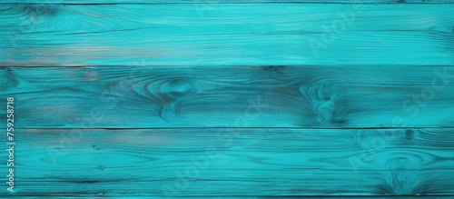 Turquoise background with a wooden texture.