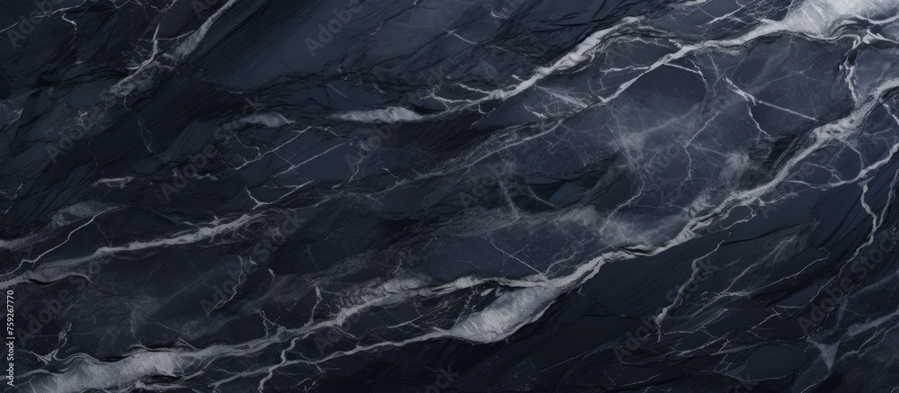 A detailed view of a black marble texture with striking white veins resembling flowing liquid waves in a windswept landscape pattern A detailed view of a black marble texture with striking white veins resembling flowing liquid waves in a windswept landscape pattern