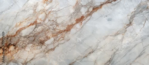 Panel kuchenny z motywem A detailed shot capturing the elegance of a white marble slab with a distinctive brown stripe running through it, showcasing the beauty of natural materials in art during the cold winter season