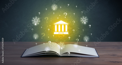 Open book with business icons above