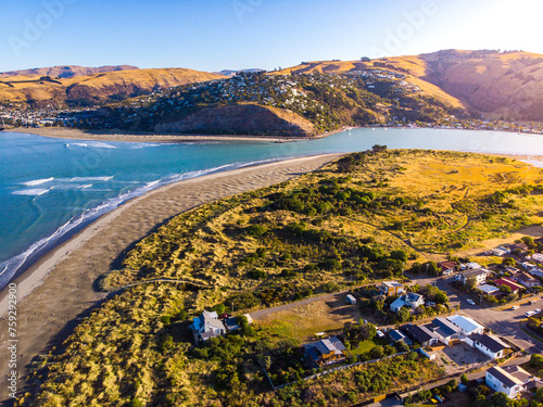 aerial panorama of christchurch city, new brighton beach, southshore and sumner beach at sunset;	 photo