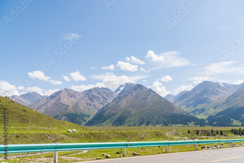 The beautiful scenery of the grasslands along the Duku Highway in Xinjiang, China photo