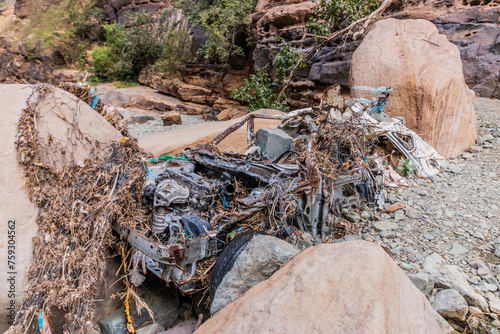 Car wreck in Wadi Lajab gorge, Saudi Arabia photo