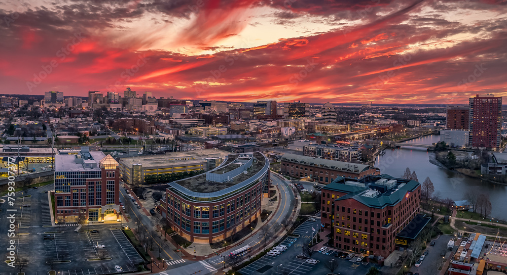 Aerial panorama view of downtown Wilmington Delaware headquarter of most US banks and companies with dramatic colorful cloudy sunset sky