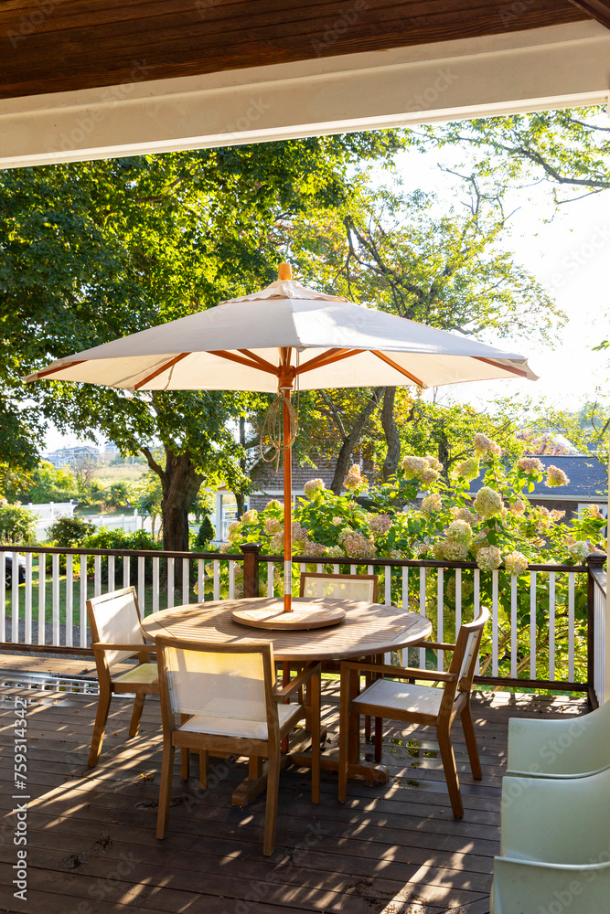 Late Summer wood house outdoor porch furniture with Hydrangea vertical Late Summer wood house outdoor porch furniture with Hydrangea vertical