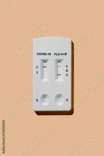 positive result in covid-19 and flu A-B rapid antigen test photo