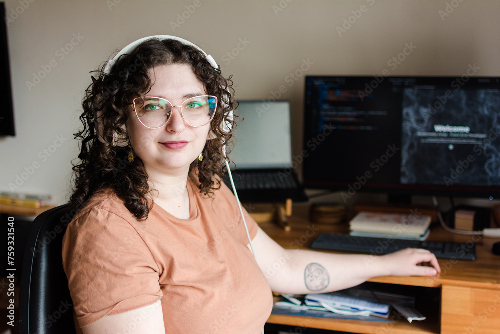 Proud woman working as a web coder Proud woman working as a web coder