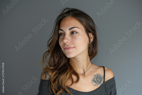 A woman with a tattoo of a rose on her shoulder