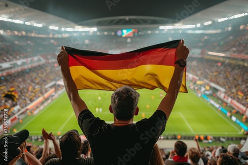 Supporter in German football fan gear photo