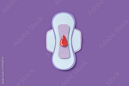 Papercraft female sanitary pad with blood droplet in middle