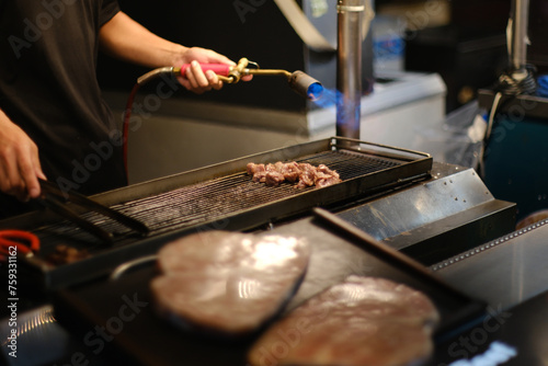 Flame Grilled Beef In Night Market  photo