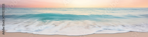 Calm and paradisiacal Caribbean beach during sunset. Sunny sea shore with foamy water and waves. Beautiful and serene beach in soft pastel pink and turquoise tones.  Summertime and marine banner. photo