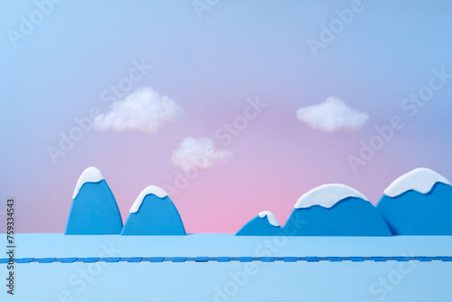 Winter season landscape with snow, railway on blue