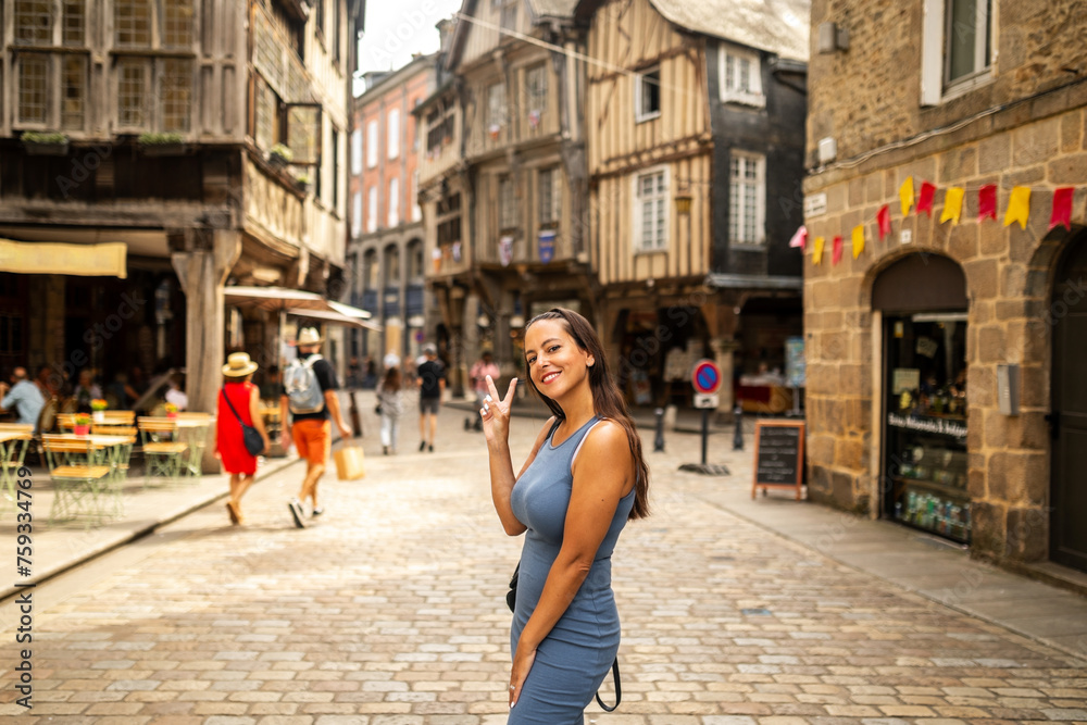 Happy young woman in a nice French city. Happy young woman in a nice French city.