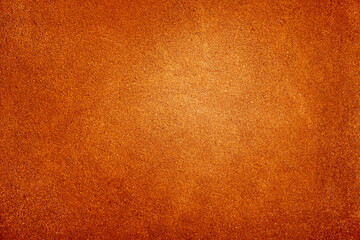 Brown red orange yellow abstract background. Painted old wall. Bright burnt hot light fire. Grunge rough grain dirty damaged rusty distressed broken surface. Design.